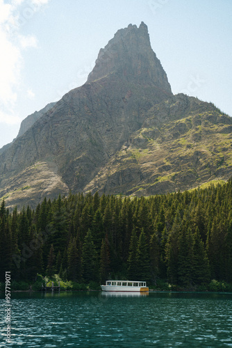 Boat on Swiftcurrent Lake photo