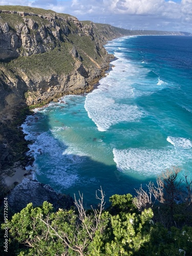 Dramatic sea cliffs over turquiose ocean