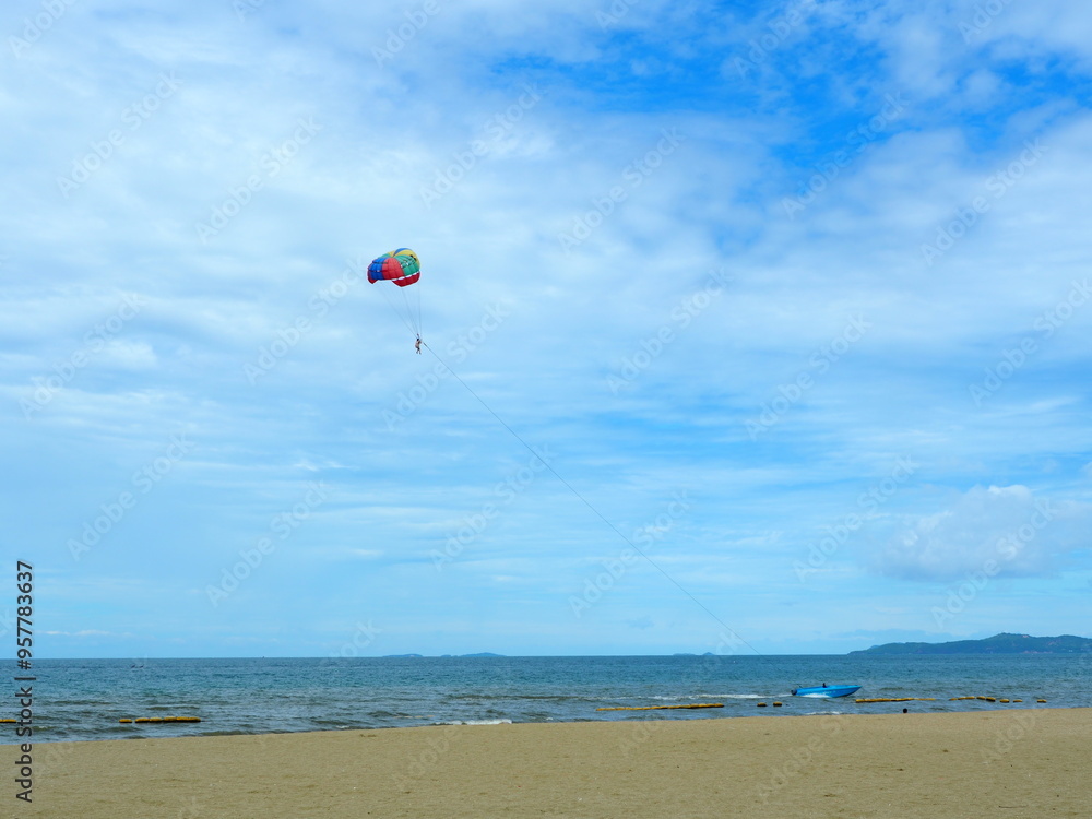 Parachute with blue sky. Famous extreme sport at the beach. Parachute with blue sky. Famous extreme sport at the beach.