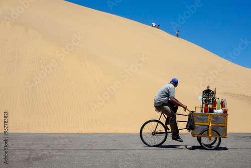 Medanos, Coro, Falcon, Venezuela. Bicycle Refreshment Vendor in the desert photo