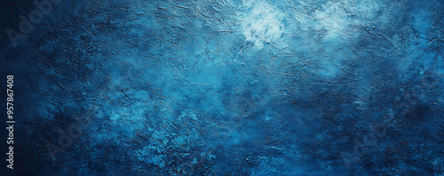 A close-up image of an abstract blue paint texture featuring visible brush strokes that create a tactile, rough surface