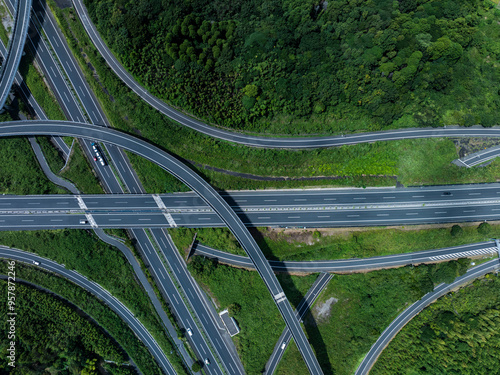 Aerial view of a highway crossing greenery