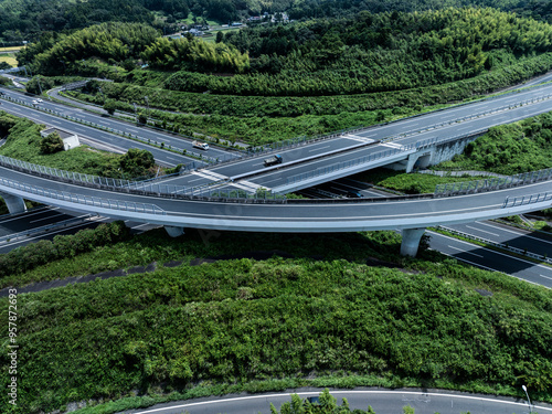 Aerial view of a highway crossing greenery