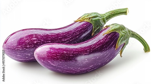 Wallpaper Mural Purple Majesty: A duo of vibrant, glossy eggplants, their rich purple skin gleaming against a stark white backdrop. Torontodigital.ca