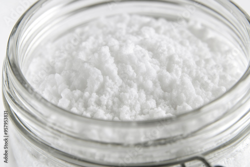 Baking soda up close in a glass jar