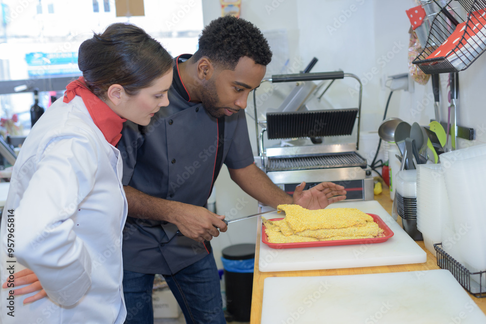 Fototapeta premium chef cutting parma raw ham