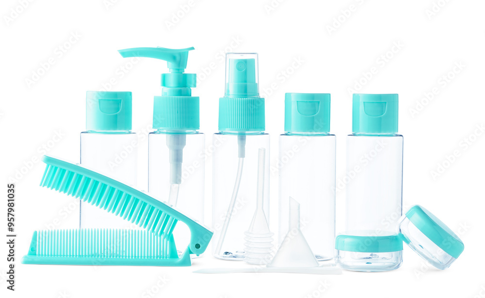 Clear cosmetic containers with turquoise lids and a comb arranged together on a white background Clear cosmetic containers with turquoise lids and a comb arranged together on a white background