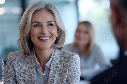 Smiling mature middle aged professional business woman