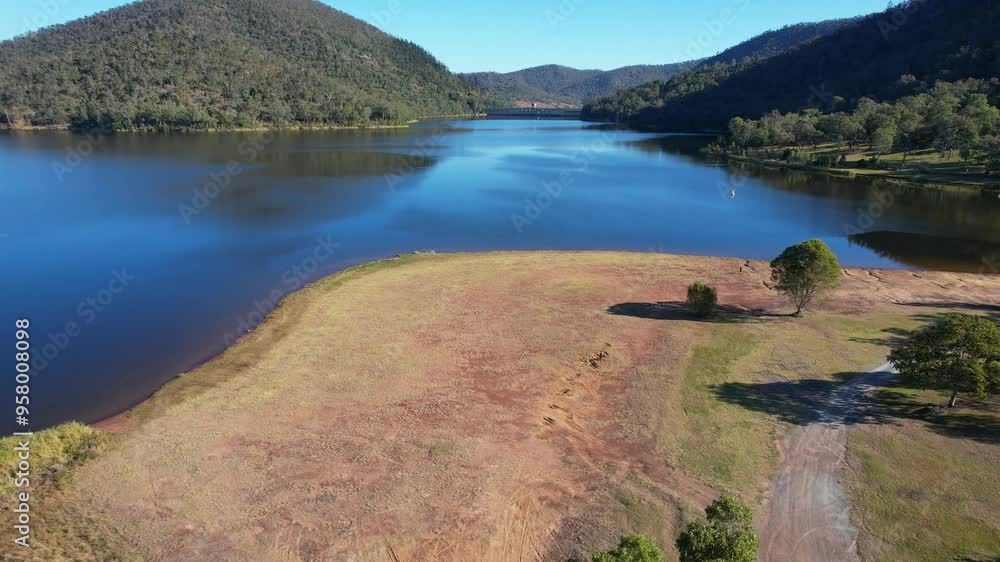 The Spit Lake Somerset Park On Lake Wivenhoe Shore In Somerset Region, QLD, Australia. drone shot The Spit Lake Somerset Park On Lake Wivenhoe Shore In Somerset Region, QLD, Australia. drone shot