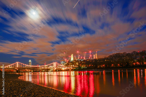 Chelsea Bridge is a bridge over the River Thames in west London, connecting Chelsea on the north bank to Battersea on the south bank photo