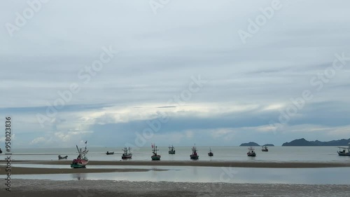 Wallpaper Mural Fishing boats are beautifully lined up on the sand during low tide. Torontodigital.ca