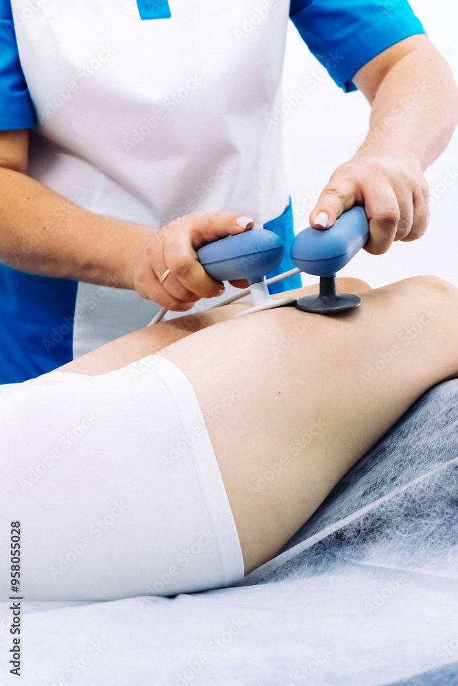 Utilizing the TR-THERAPY local diathermy technique in a state-of-the-art clinic for targeted pain relief. Ideal for highlighting sophisticated physiotherapy methods and innovative medical treatments. Utilizing the TR-THERAPY local diathermy technique in a state-of-the-art clinic for targeted pain relief. Ideal for highlighting sophisticated physiotherapy methods and innovative medical treatments.