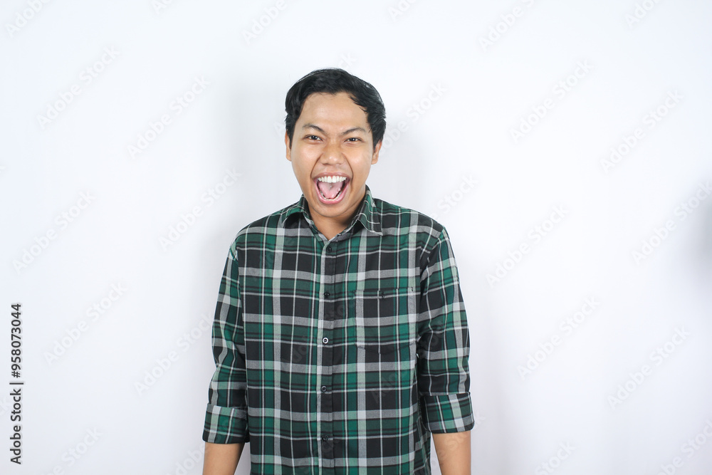 isolated excited asian man screaming to announce discount and promo with looking at camera isolated excited asian man screaming to announce discount and promo with looking at camera
