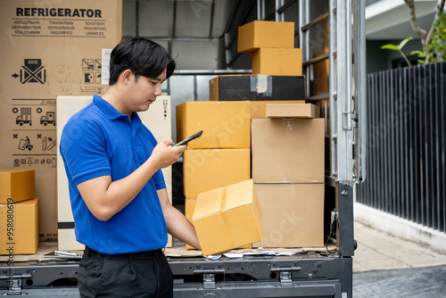 Delivery man scanning a package to confirm delivery.