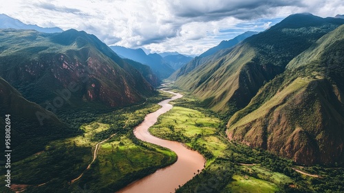 Bird's-eye view of the scenic Urubamba River, winding through lush green valleys and rugged mountains