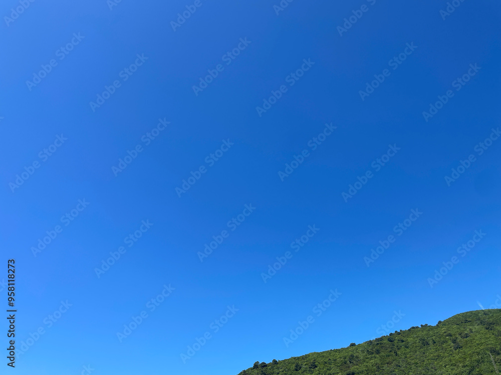 Blue sky and clouds background with trees frame. Landscape photo with copy space Blue sky and clouds background with trees frame. Landscape photo with copy space