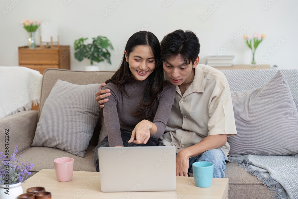 Young couple enjoying a movie night at home Young couple enjoying a movie night at home