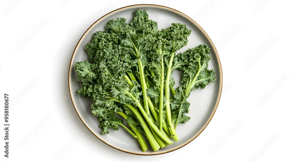 Fresh organic kale on plate - vibrant green leafy vegetable for healthy eating Fresh organic kale on plate - vibrant green leafy vegetable for healthy eating
