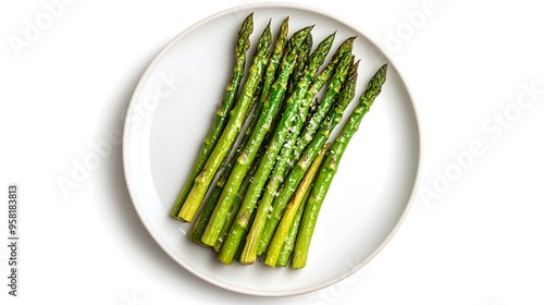 Healthy grilled asparagus with sea salt on a white plate