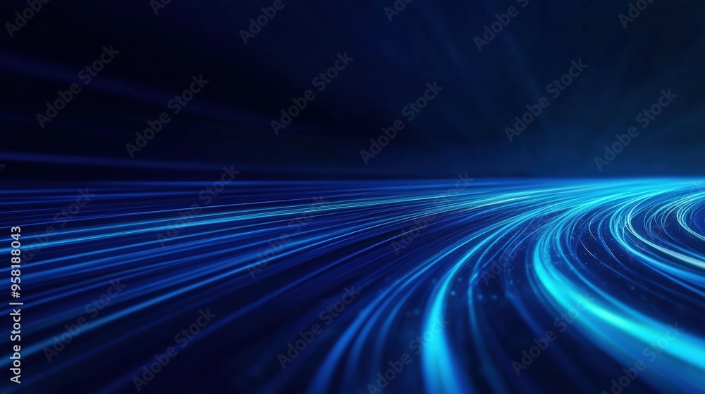 Dynamic blue light trails create a sense of motion and energy against a dark background, perfect for technology and abstract themes. Dynamic blue light trails create a sense of motion and energy against a dark background, perfect for technology and abstract themes.