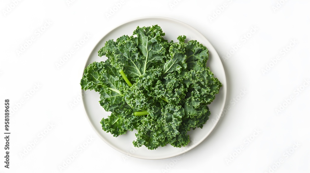 Fresh kale on white plate - vibrant green leaves for healthy vegan dining inspiration Fresh kale on white plate - vibrant green leaves for healthy vegan dining inspiration