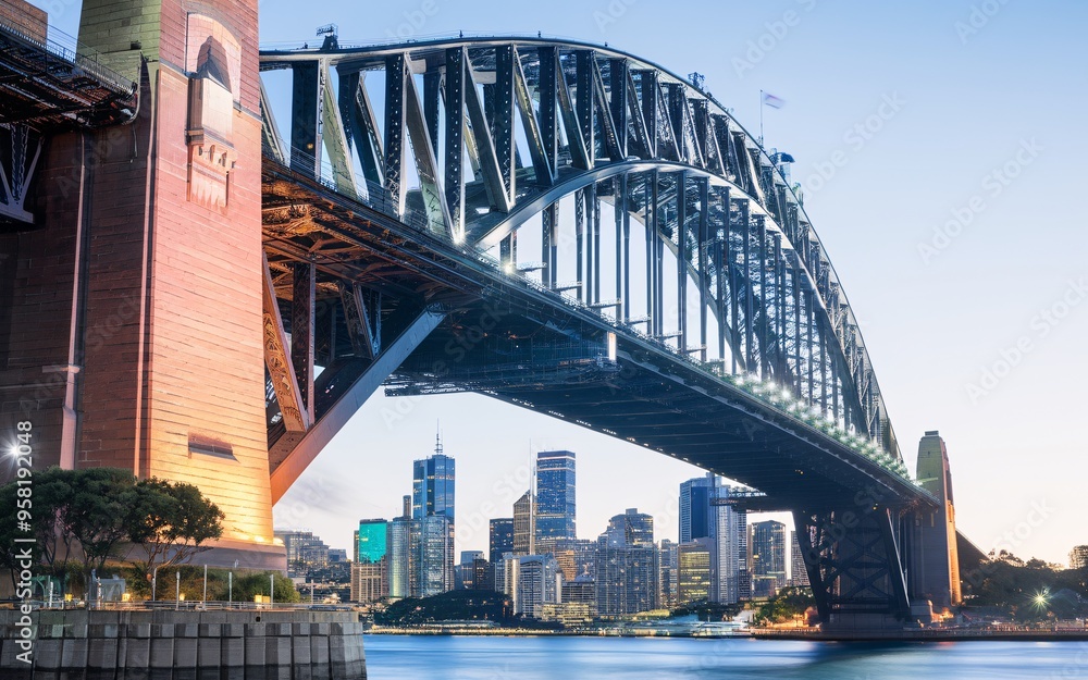 Naklejka premium Sydney Harbour Bridge with City Skyline Sunrise Background