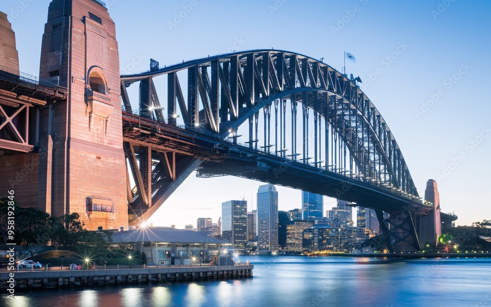 Obraz premium Sydney Harbour Bridge with City Skyline Sunrise Background