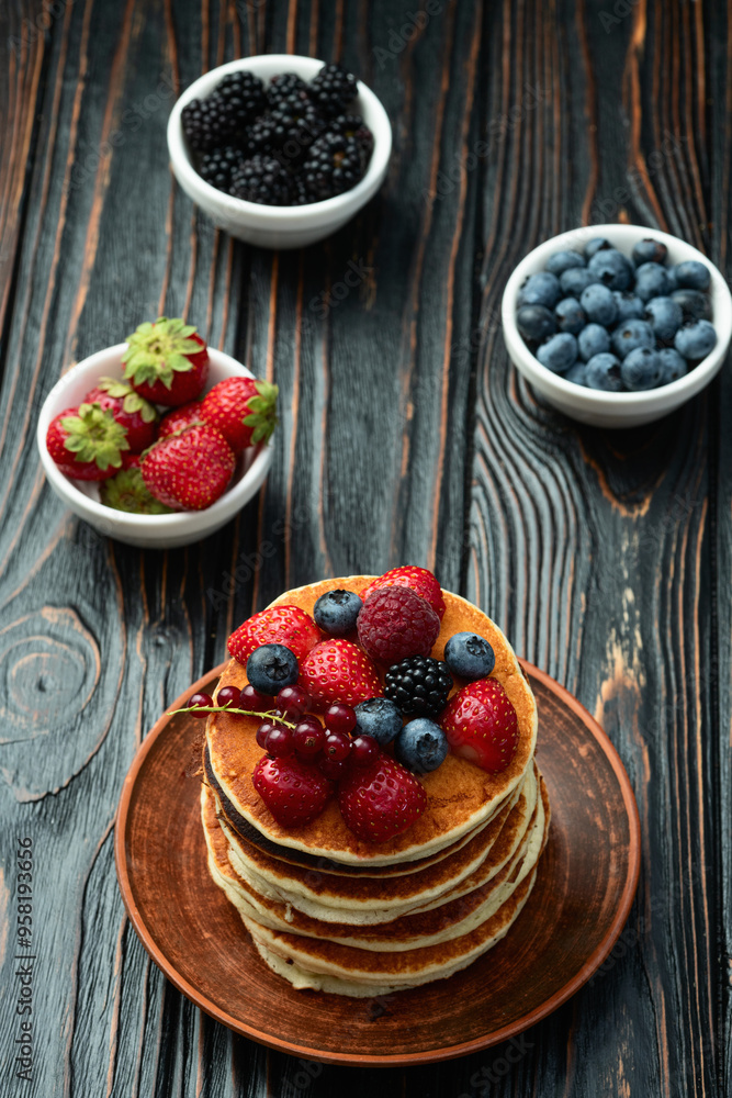 Stack of homemade american pancakes with berries . Top view Stack of homemade american pancakes with berries . Top view