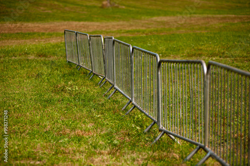  fence in a field of grass in the park