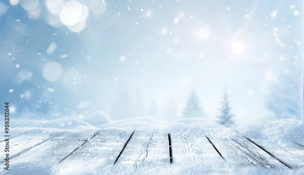 Winter christmas scenic landscape with wooden flooring strewn with snow in forest in background blurred fir-trees covered with snow on nature.