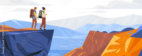 Hikers standing on cliff edge overlooking dramatic mountain landscape adventure travel outdoor exploration concept