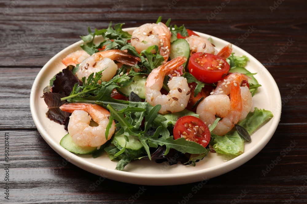 Delicious shrimp salad with vegetables on wooden table, closeup Delicious shrimp salad with vegetables on wooden table, closeup