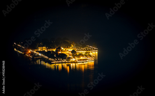 night view of lake city with with dramatic lighting from unique perspective photo