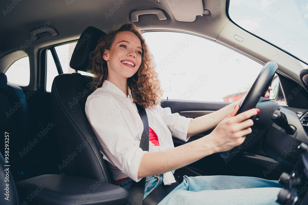 Photo of lovely shiny girl wear white shirt smiling riding vehicle enjoying test drive outdoors urban city street