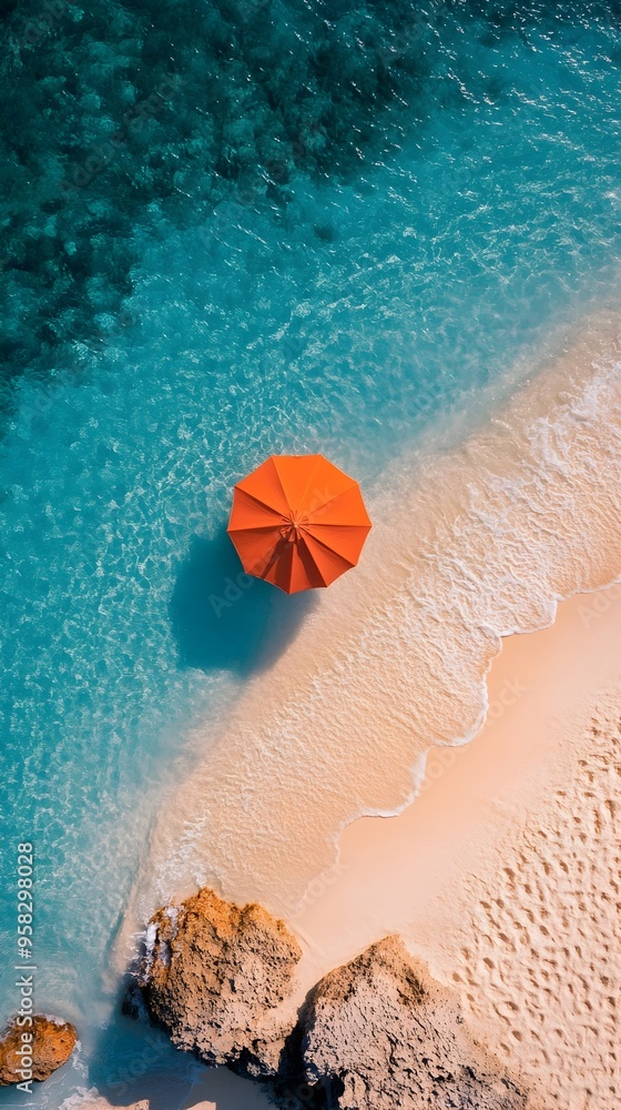 Fototapeta premium Aerial View of Sun Umbrella on a Beautiful Summer Beach with Turquoise Waters
