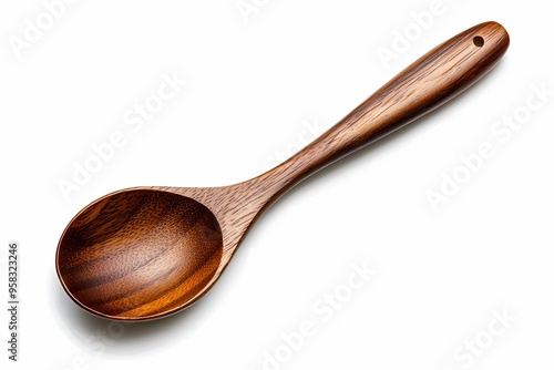 Close-up of a handcrafted wooden spoon with a smooth, polished finish, placed against a clean white background.