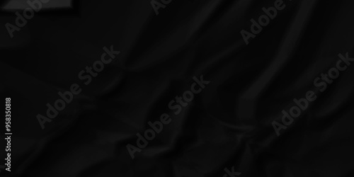 Dark black crumpled paper texture background. black crumpled and top view textures can be used for background of text or any contents.