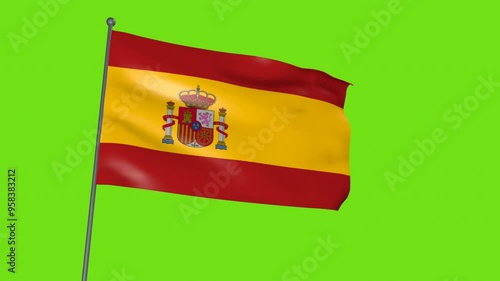 Spain's flag fluttering in the wind, on a green screen background. photo