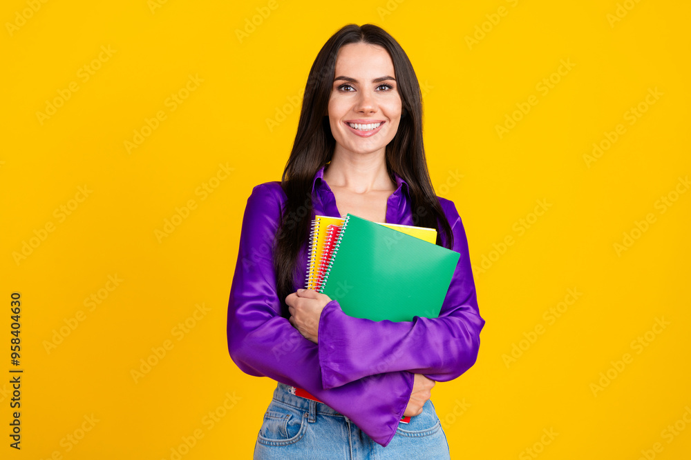 Photo of positive smiling lady hold books textbooks isolated bright color background Photo of positive smiling lady hold books textbooks isolated bright color background