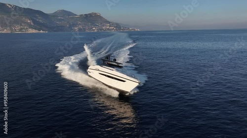 Aerial view of a yacht sailing at full speed