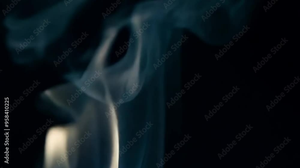 A smooth tilt-up shot follows the ethereal smoke rising against a dark background, with soft lighting and low contrast A smooth tilt-up shot follows the ethereal smoke rising against a dark background, with soft lighting and low contrast
