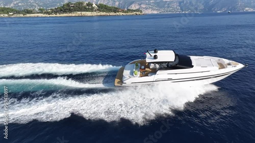 Aerial view of a yacht sailing at full speed