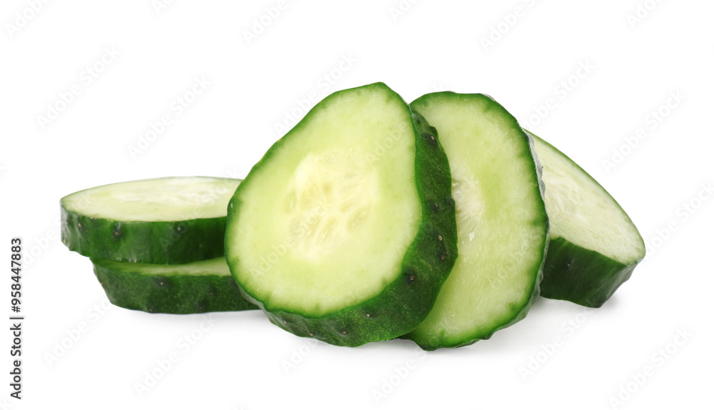 Slices of fresh cucumber isolated on white Slices of fresh cucumber isolated on white