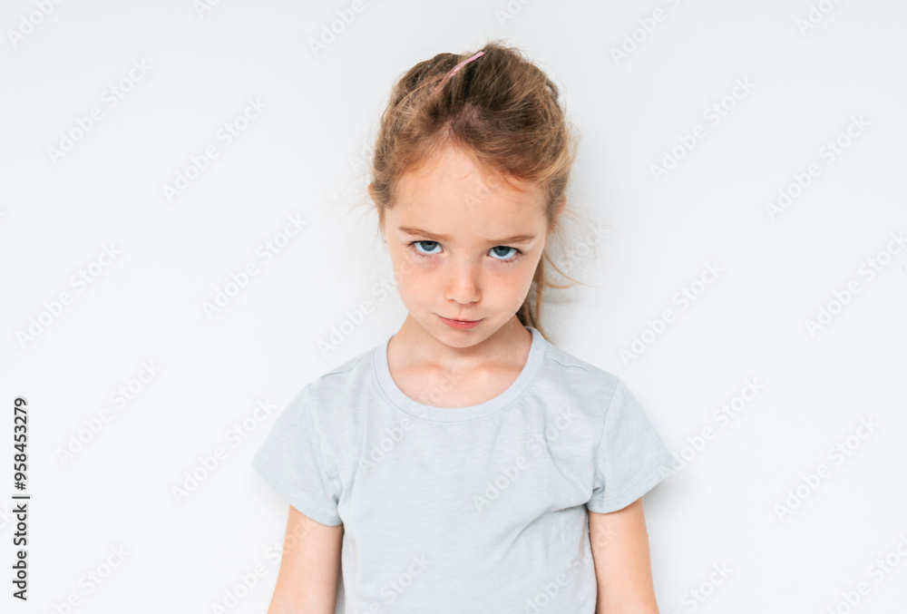 Cute girl 4-5 year old posing in studio Cute girl 4-5 year old posing in studio