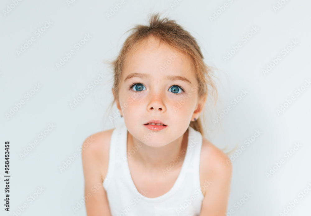 Cute girl 4-5 year old posing in studio Cute girl 4-5 year old posing in studio