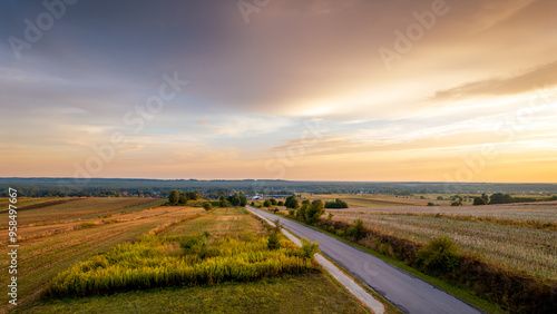 Obraz na płótnie Beautiful landscape. Colorful sky, road and fields. Forests in the distance. View from the observation tower. .Susiec, Roztocze, Poland w salonie