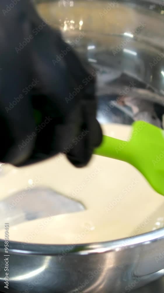 fresh hollandaise sauce in a pot with whisk fresh hollandaise sauce in a pot with whisk