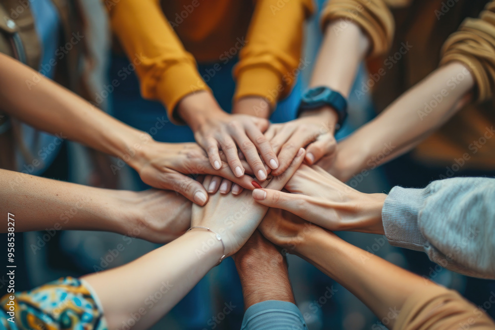 Fototapeta premium Diverse Group of People Stacking Hands Together in Unity and Teamwork