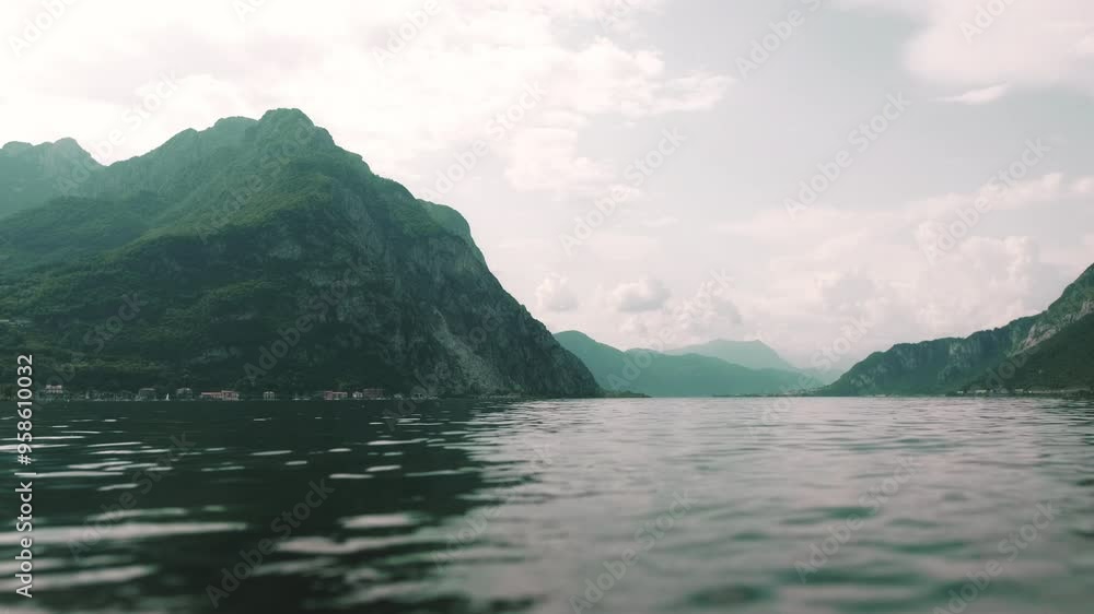 View from the water of a mountain lake, slow motion View from the water of a mountain lake, slow motion