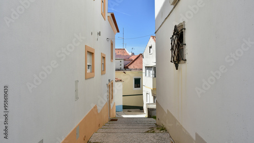 Narrow Terraced Alley with Indirect Sunlight on a Clear Day in Nazaré, Portugal